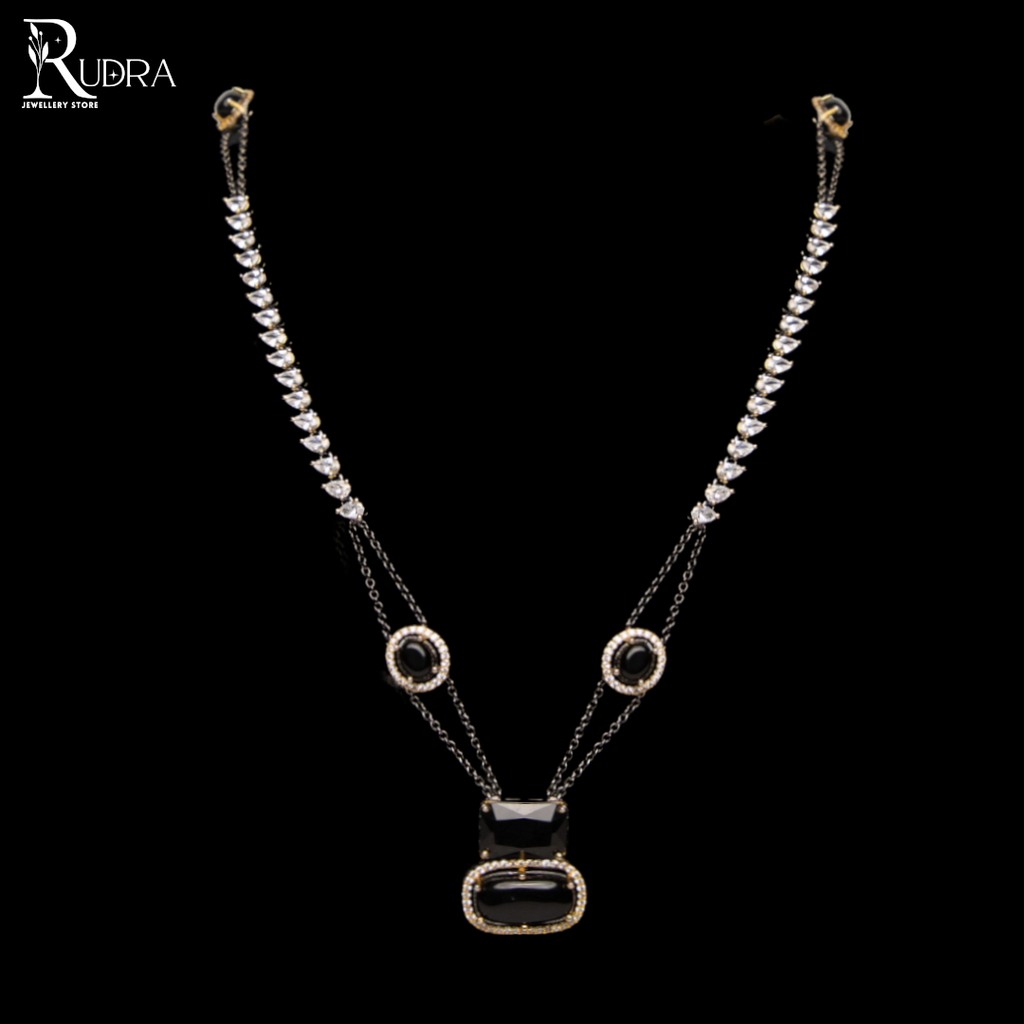 "bismil ki mehfil mumbai black stone necklace tourmaline stone"