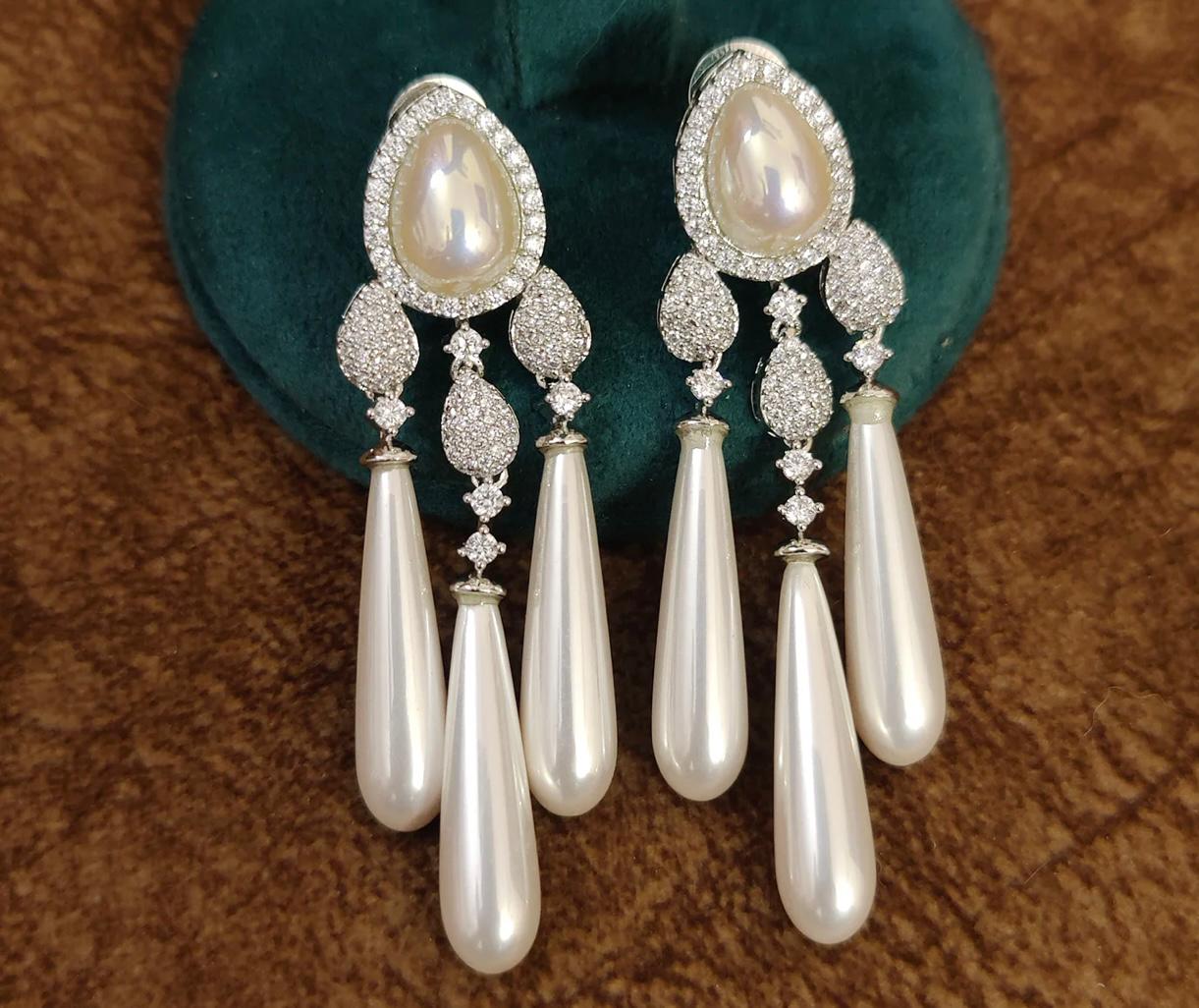 "pearl drop american diamond earring in silver platting"
