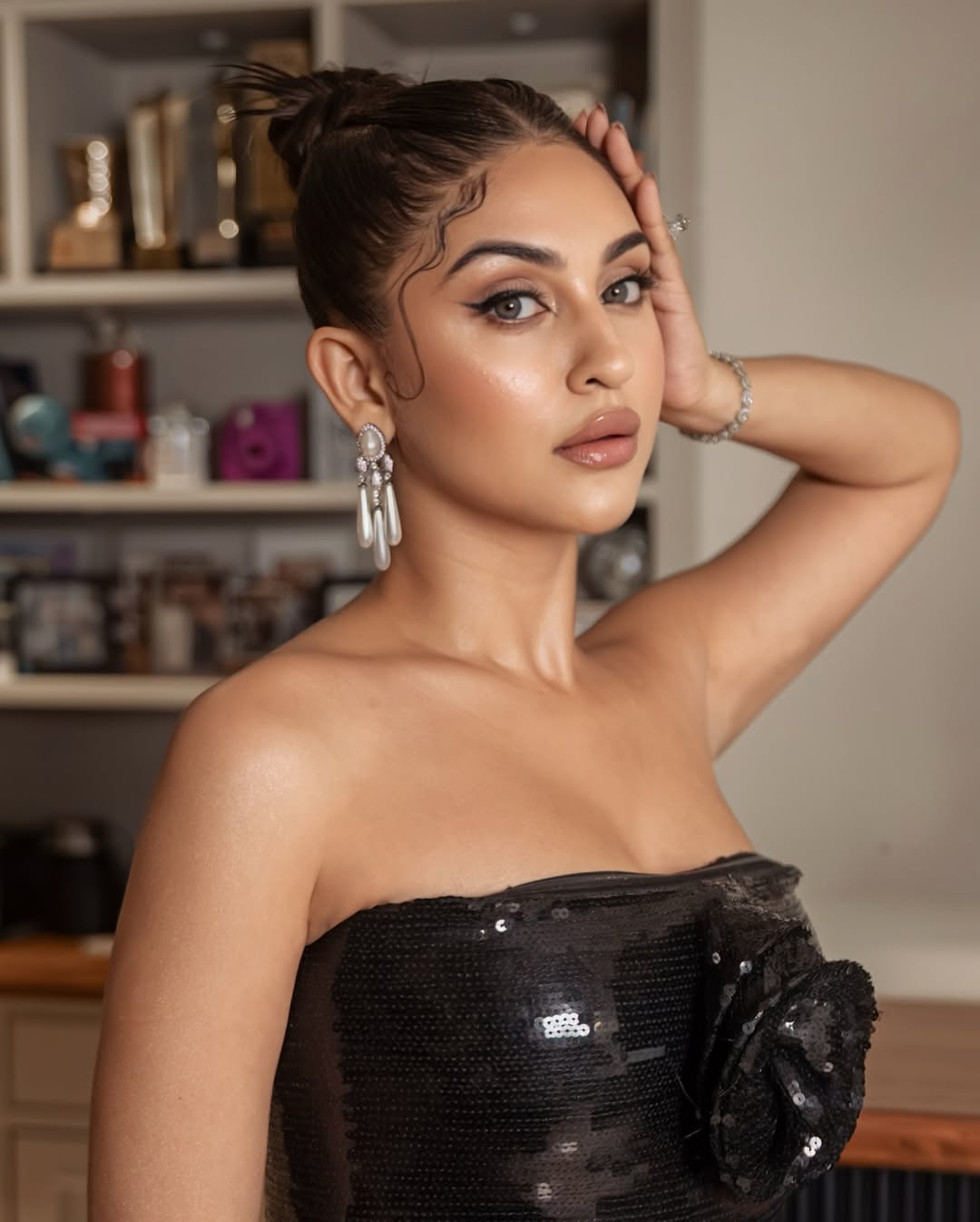 "pearl drop earring by rudra jewellery store in silver platting"