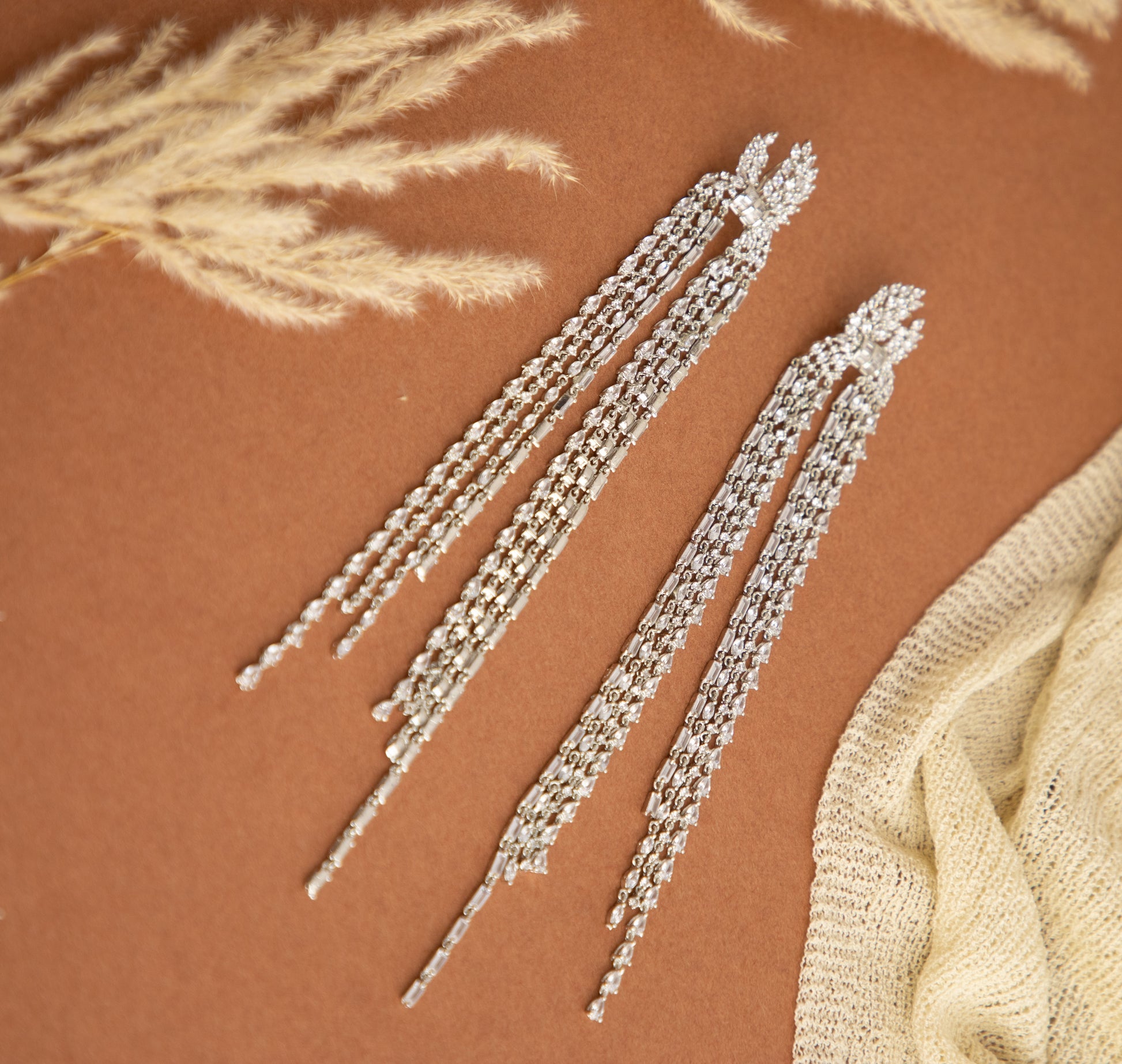 "long American diamond Swarovski earring celebrity inspired in silver plating"